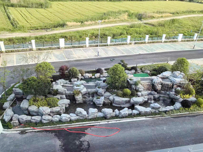 揚(yáng)州明德制藥廠水泥塑山瀑布工程